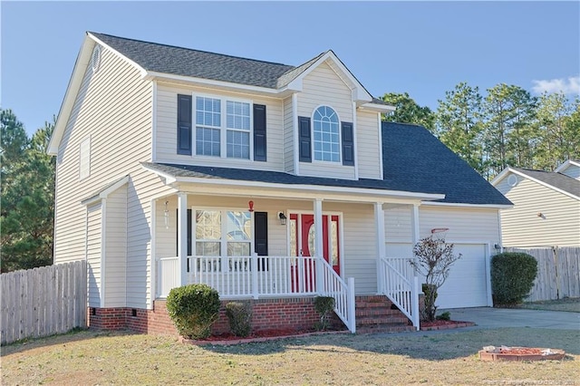 traditional home featuring covered porch, crawl space, fence, a garage, and driveway