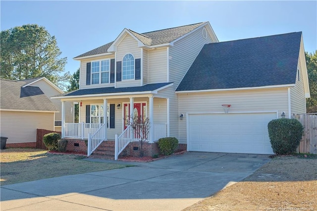 traditional-style home with a porch, a shingled roof, concrete driveway, an attached garage, and crawl space