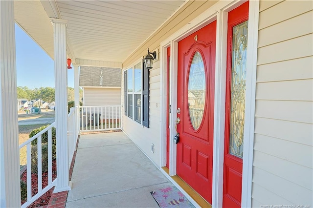 doorway to property with covered porch