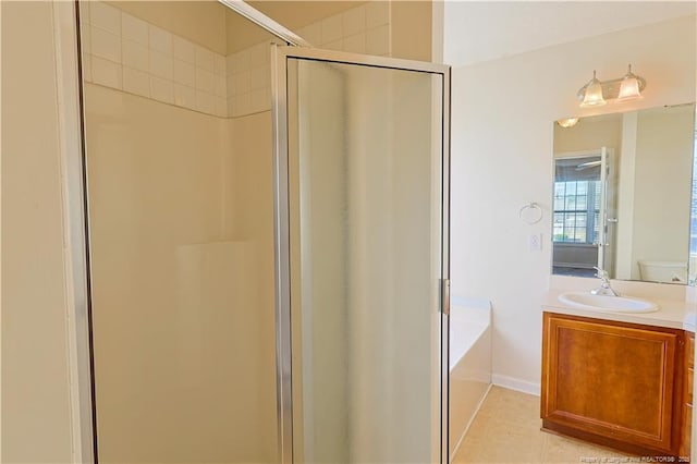 bathroom with vanity, a shower stall, a bath, and tile patterned floors