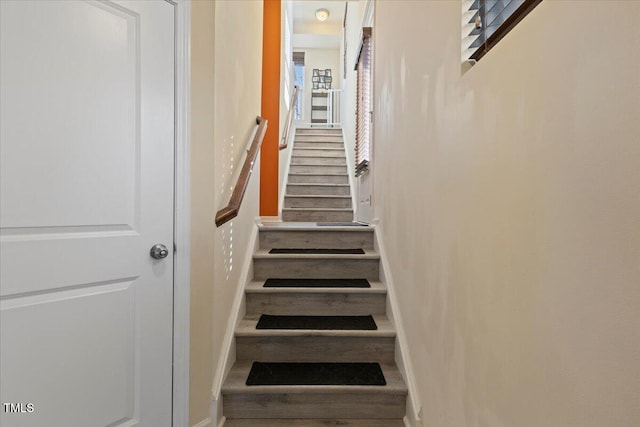 staircase with baseboards