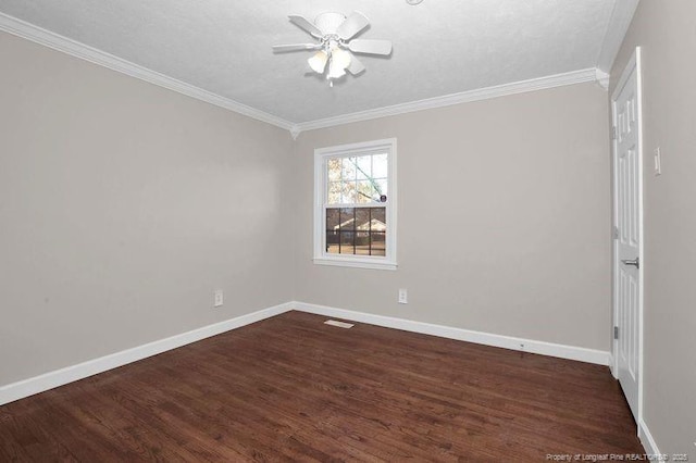 unfurnished room featuring crown molding, dark wood-type flooring, a ceiling fan, and baseboards