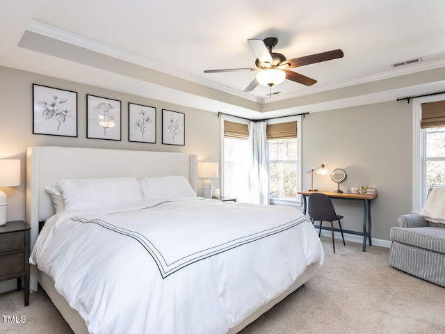 carpeted bedroom featuring visible vents, multiple windows, and crown molding