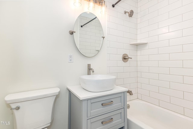 full bathroom with vanity, toilet, and tub / shower combination