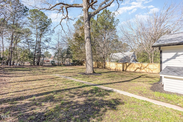 view of yard featuring fence