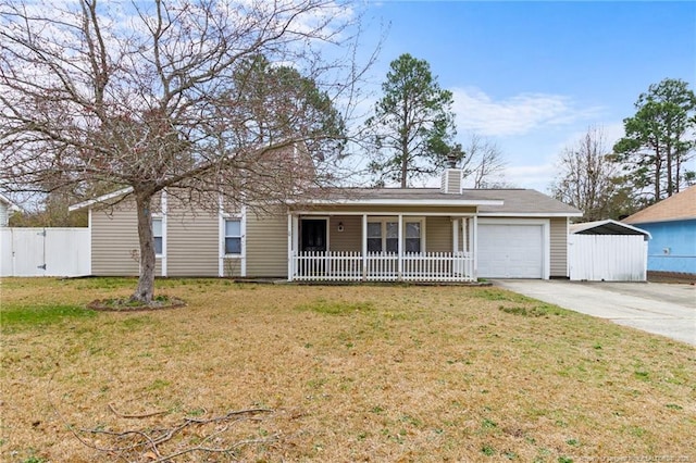 ranch-style home with a chimney, covered porch, concrete driveway, fence, and a front lawn