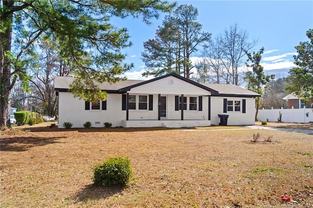 single story home with crawl space and fence