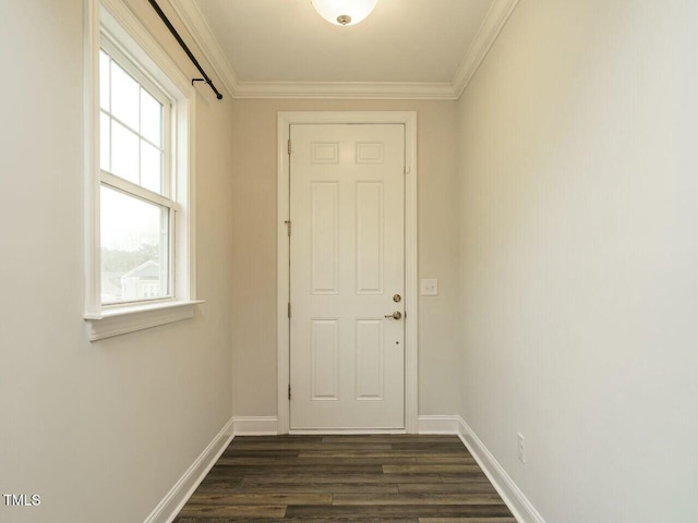 doorway to outside featuring ornamental molding, baseboards, and dark wood-style flooring