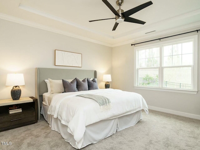 bedroom with a ceiling fan, baseboards, visible vents, light carpet, and crown molding