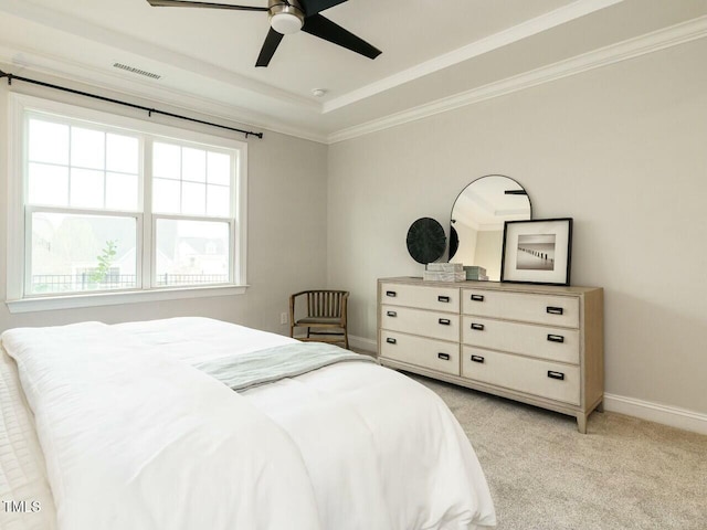 bedroom with visible vents, light carpet, crown molding, baseboards, and ceiling fan