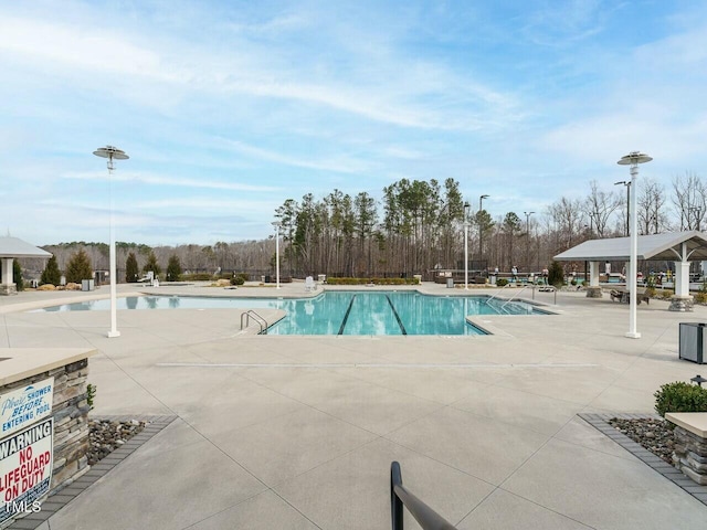 pool featuring a patio area