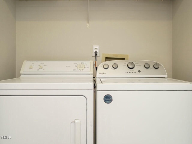 laundry area featuring laundry area and washing machine and clothes dryer