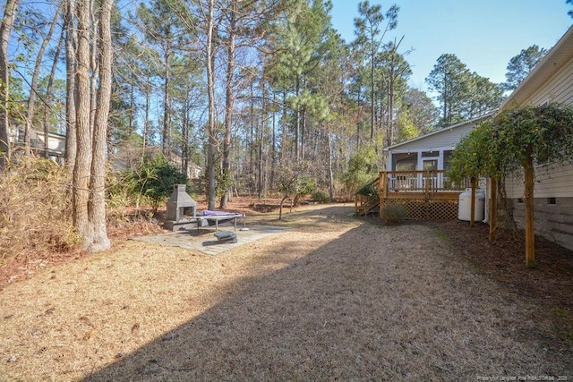 view of yard featuring a deck