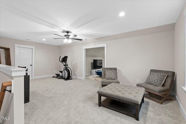 exercise room with light carpet, baseboards, a ceiling fan, and recessed lighting