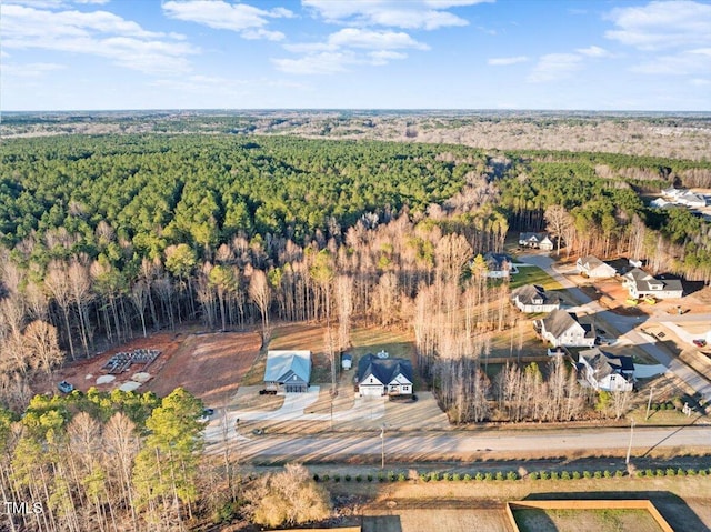 bird's eye view with a view of trees