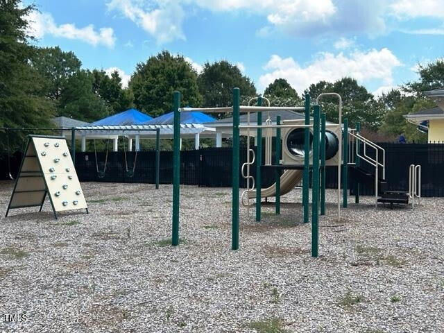 community playground featuring fence