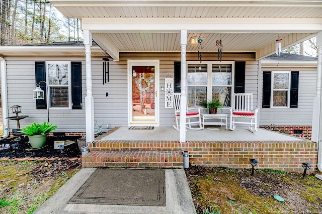 doorway to property with a porch