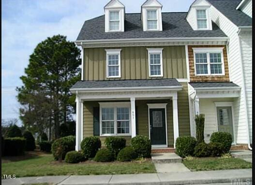 view of front of property featuring covered porch and board and batten siding