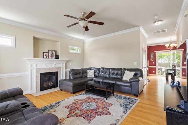 801 Myrtle Grove Ln, Apex, NC 27502 - living room featuring visible vents, crown molding, and wood finished floors