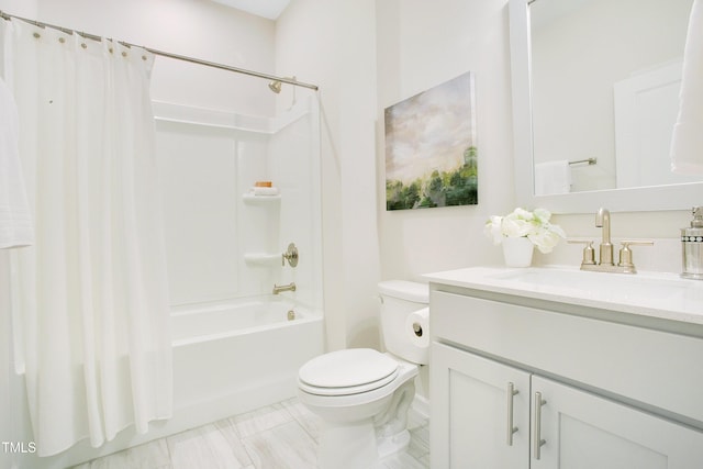 full bathroom featuring vanity, toilet, and shower / tub combo with curtain