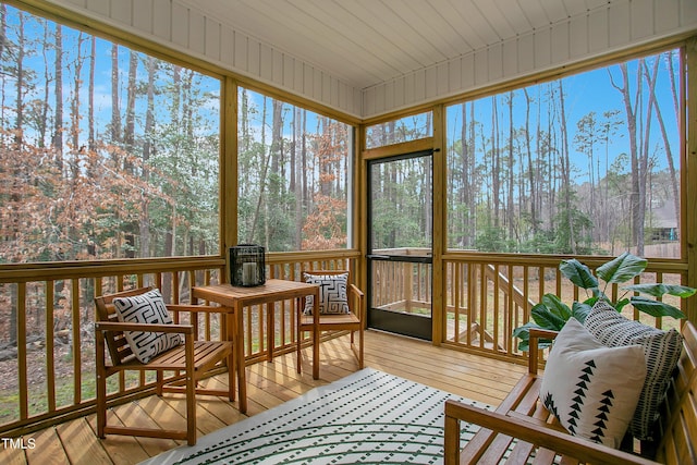 sunroom / solarium featuring plenty of natural light