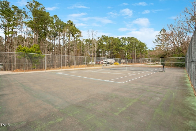 view of sport court featuring community basketball court and fence