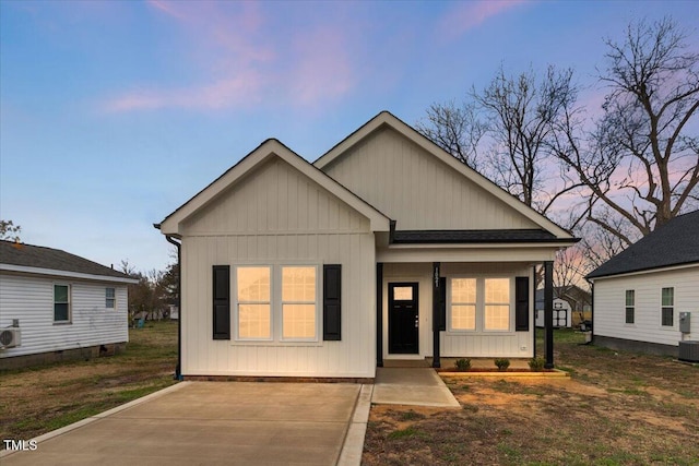 view of front of house featuring central air condition unit and board and batten siding