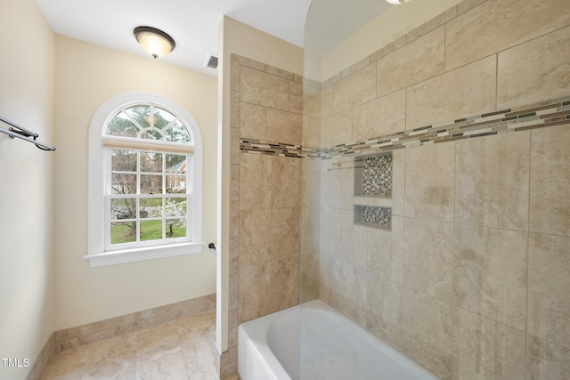 full bath featuring visible vents, baseboards, and shower / bathtub combination