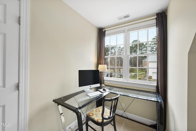 office area with baseboards and visible vents