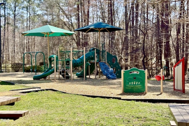 community playground featuring a yard