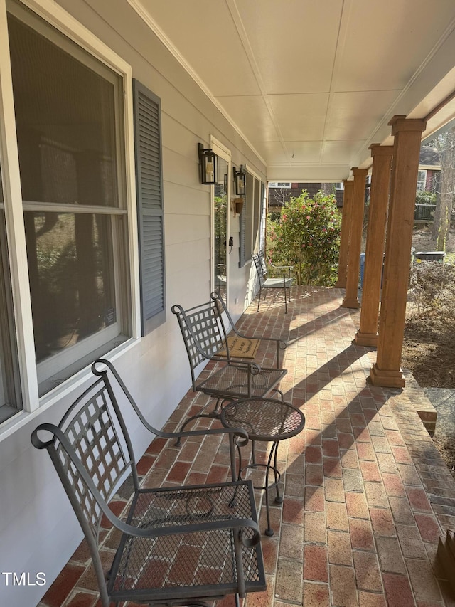 view of patio featuring a porch