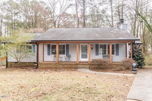 single story home with roof with shingles, a porch, a chimney, and crawl space