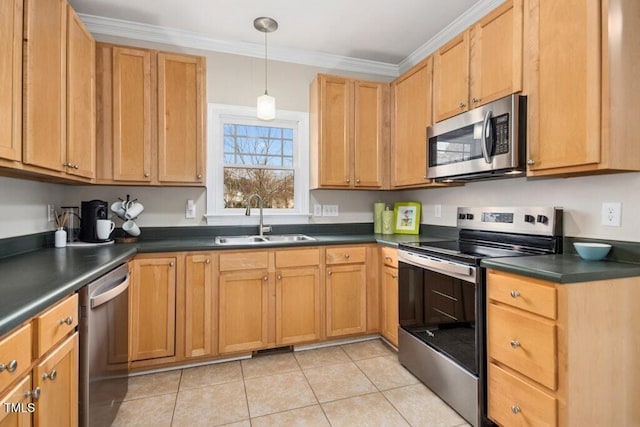 kitchen featuring dark countertops, crown molding, light tile patterned flooring, stainless steel appliances, and a sink