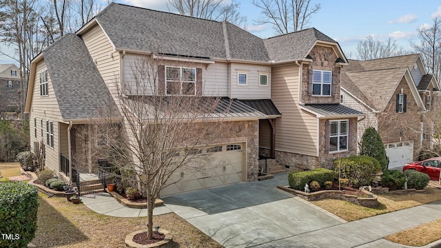 craftsman-style home featuring driveway, an attached garage, stone siding, and roof with shingles