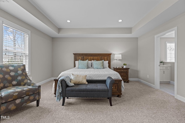 bedroom featuring recessed lighting, baseboards, and light colored carpet