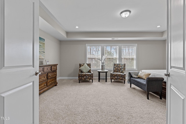 living area featuring recessed lighting, baseboards, and carpet flooring