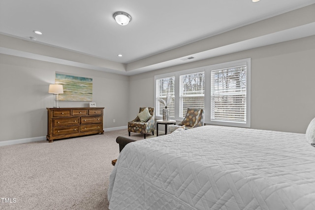 carpeted bedroom featuring recessed lighting, baseboards, and visible vents