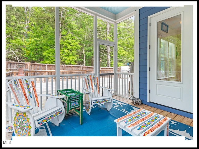 sunroom / solarium with a wealth of natural light