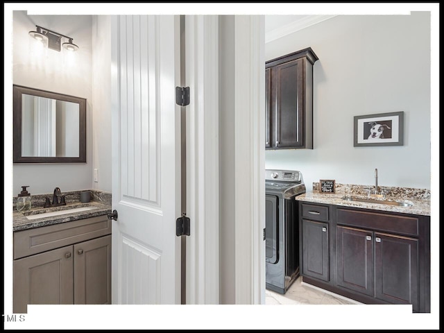 bathroom with vanity and crown molding