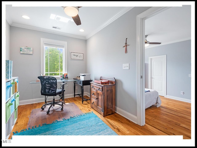 office area with crown molding, ceiling fan, and wood finished floors