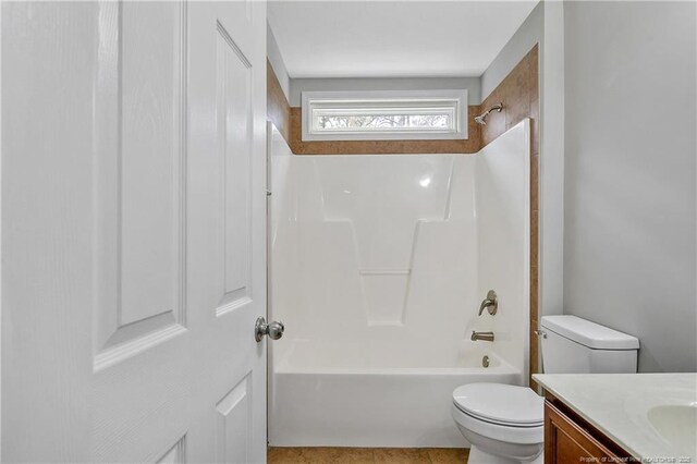 full bath with toilet, bathing tub / shower combination, and vanity