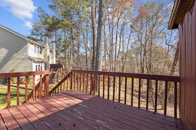 wooden deck featuring central air condition unit