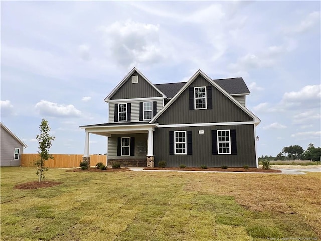 3571 Arabia Rd, Raeford, NC 28317 - craftsman house featuring a porch, board and batten siding, and stone siding