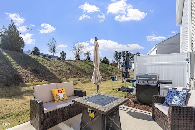 view of patio / terrace featuring an outdoor living space and a grill