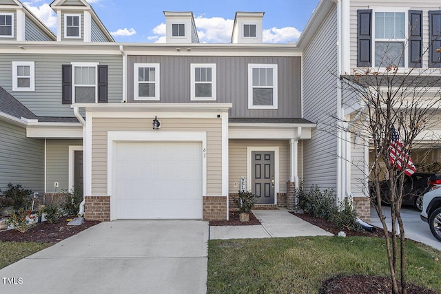 63 Pale Moss Dr, Clayton, NC 27527 - view of property with an attached garage, board and batten siding, and driveway