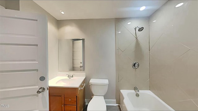 full bath with toilet, shower / bathing tub combination, vanity, and baseboards