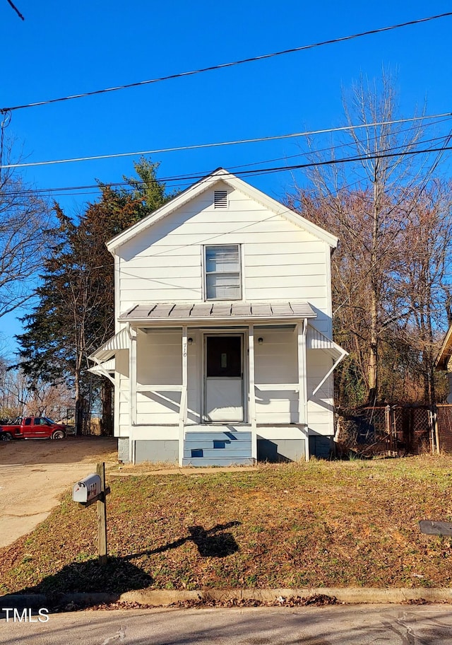 view of front of property featuring a porch and crawl space