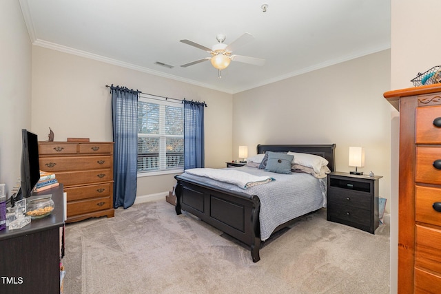 bedroom with visible vents, baseboards, ornamental molding, light carpet, and a ceiling fan