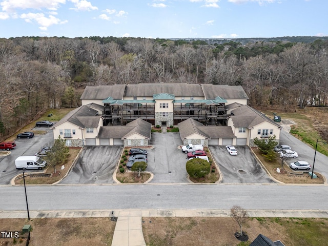 bird's eye view featuring a view of trees