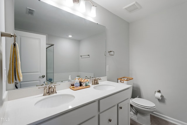 full bathroom with toilet, visible vents, and a sink